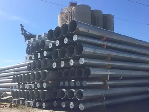 A large stack of steel pipe